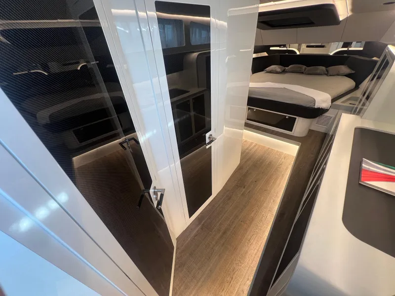 Slide: The Image of Interior of 2023 Canados 493 Gladiator yacht, featuring modern design and luxurious sleeping area. - 17