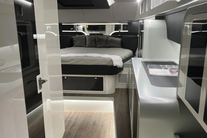 Slide: The Image of Luxurious interior of 2023 Canados 493 Gladiator yacht with modern design and cozy bedding. - 18