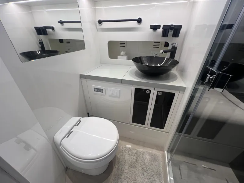 Slide: The Image of Modern bathroom in 2023 Canados 493 Gladiator yacht with sleek fixtures and elegant design. - 22