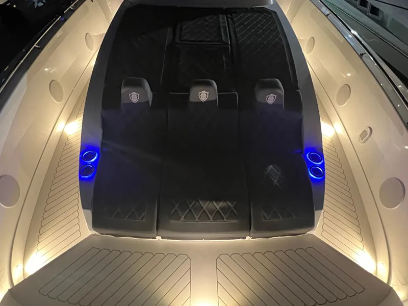 Slide: The Image of 2023 Canados 493 Gladiator yacht interior with illuminated seating and modern design. - 27