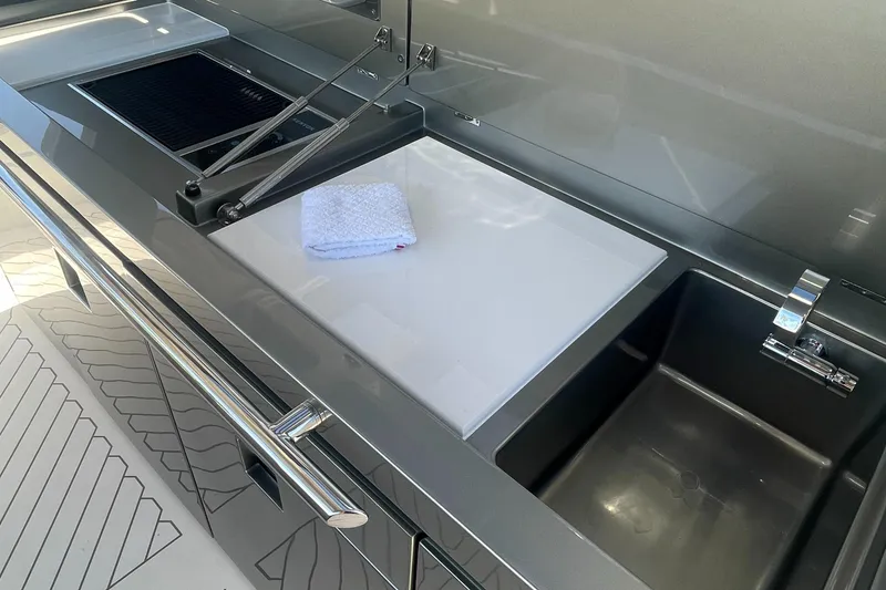 Slide: The Image of Modern kitchen area on the 2023 Canados 493 Gladiator yacht. - 35
