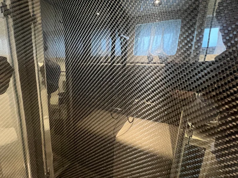 Slide: The Image of 2023 Canados 493 Gladiator interior with carbon fiber detailing. - 47