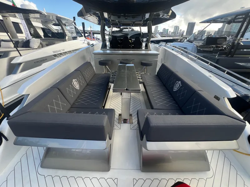 Slide: The Image of 2023 Canados 493 Gladiator luxury yacht interior with sleek seating and modern design. - 5