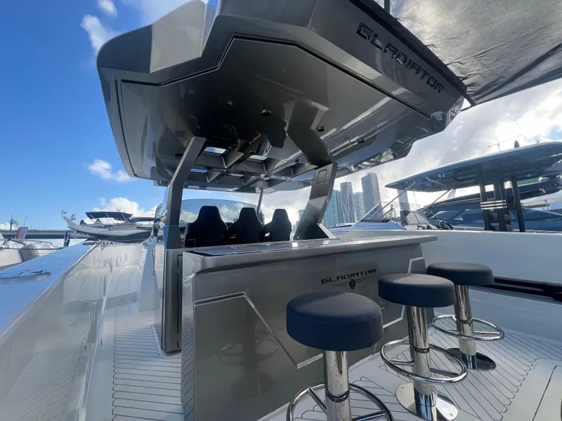 Slide: The Image of 2023 Canados 493 Gladiator yacht with sleek design and modern seating. - 6