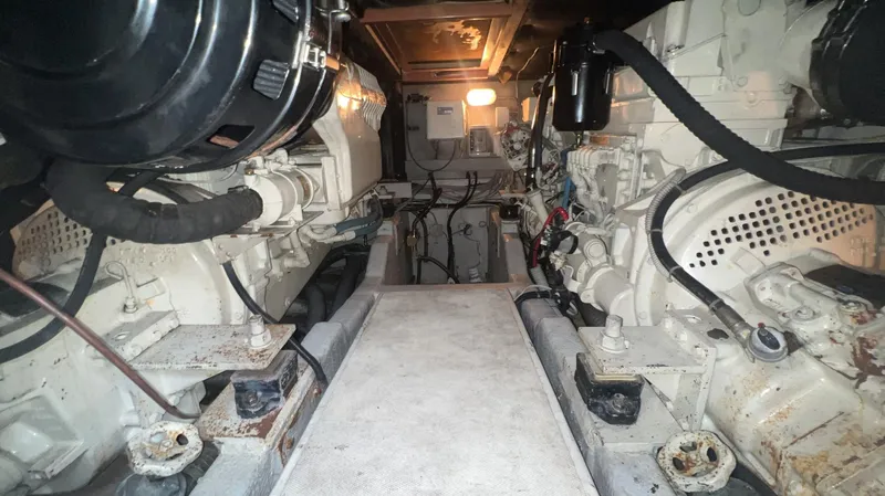 Slide: The Image of Engine room of a 2001 Uniesse Flybridge 48 yacht. - 38
