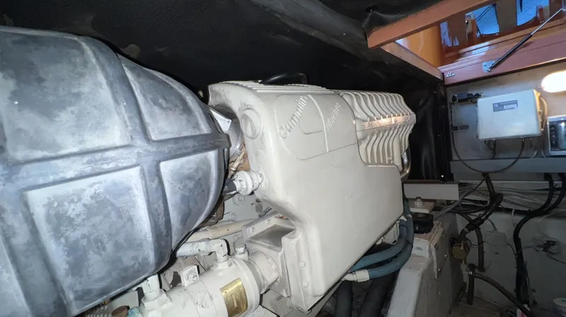 Slide: The Image of Engine compartment of a 2001 Uniesse Flybridge 48 yacht. - 49