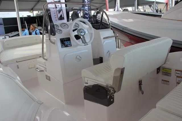 Slide: The Image of 2024 Zar Formenti 53 boat interior with steering console and seating. - 3