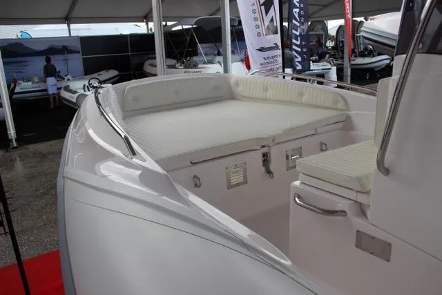 Slide: The Image of 2024 Zar Formenti 53 boat interior at a boat show. - 4