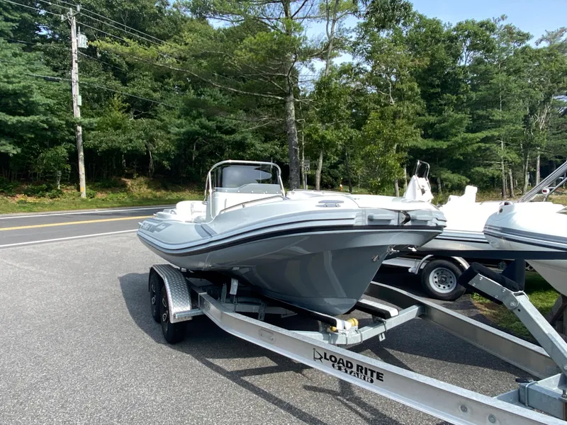 Slide: The Image of 2024 Zar Formenti 53 boat on Load Rite trailer in outdoor setting. - 8