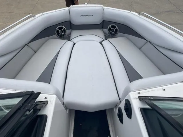 Slide: The Image of 2012 Moomba Mojo 2.5 boat interior with gray and white seating. - 18
