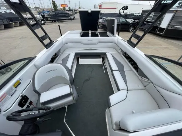 Slide: The Image of 2012 Moomba Mojo 2.5 boat interior with seating and steering wheel. - 20