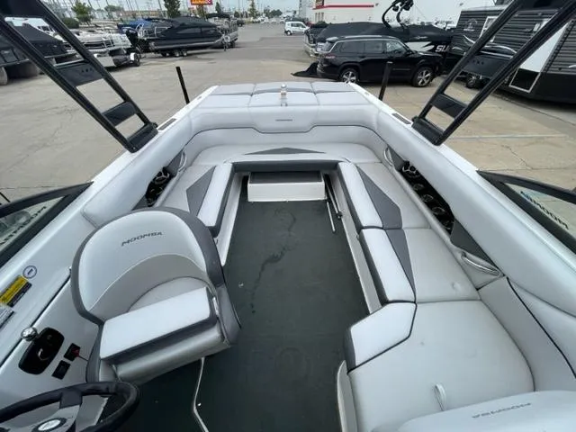 Slide: The Image of 2012 Moomba Mojo 2.5 boat interior with white and gray seating. - 21