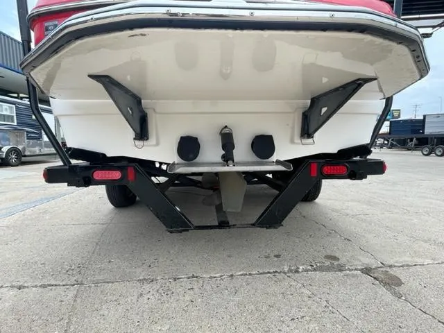 Slide: The Image of 2012 Moomba Mojo 2.5 boat rear view on trailer, showing propeller and rudder. - 4