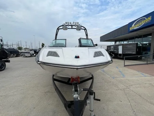 Slide: The Image of 2012 Moomba Mojo 2.5 boat on trailer at dealership. - 6