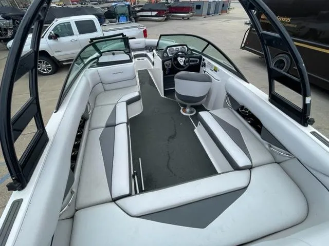 Slide: The Image of 2012 Moomba Mojo 2.5 boat interior with seating and steering wheel. - 8