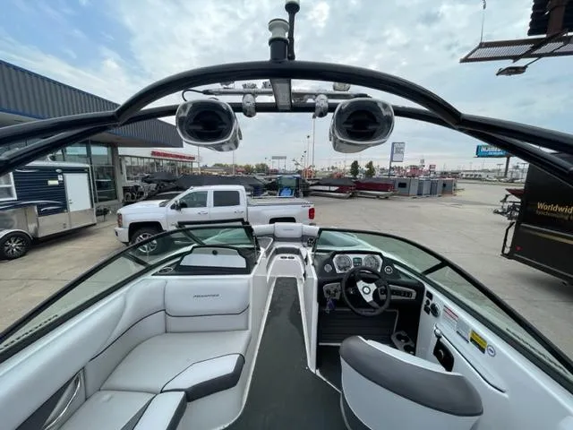 Slide: The Image of 2012 Moomba Mojo 2.5 boat interior with dashboard and seating. - 9