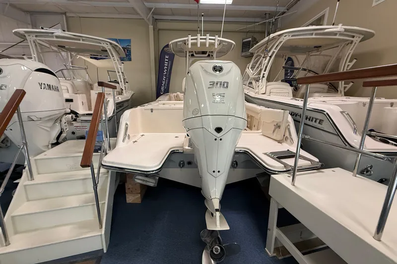 Slide: The Image of 2026 Grady-White Fisherman 236 boat with Yamaha 300 engine in showroom. - 3
