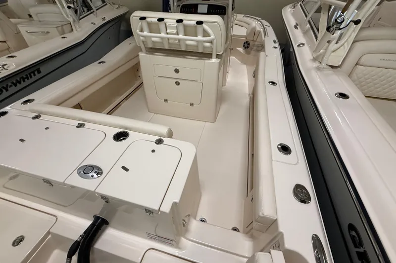 Slide: The Image of 2026 Grady-White Fisherman 236 boat interior with seating and storage compartments. - 5