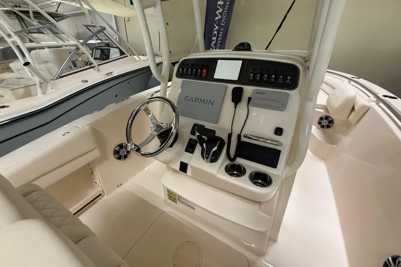 Slide: The Image of 2026 Grady-White Fisherman 236 boat console with Garmin navigation system. - 6