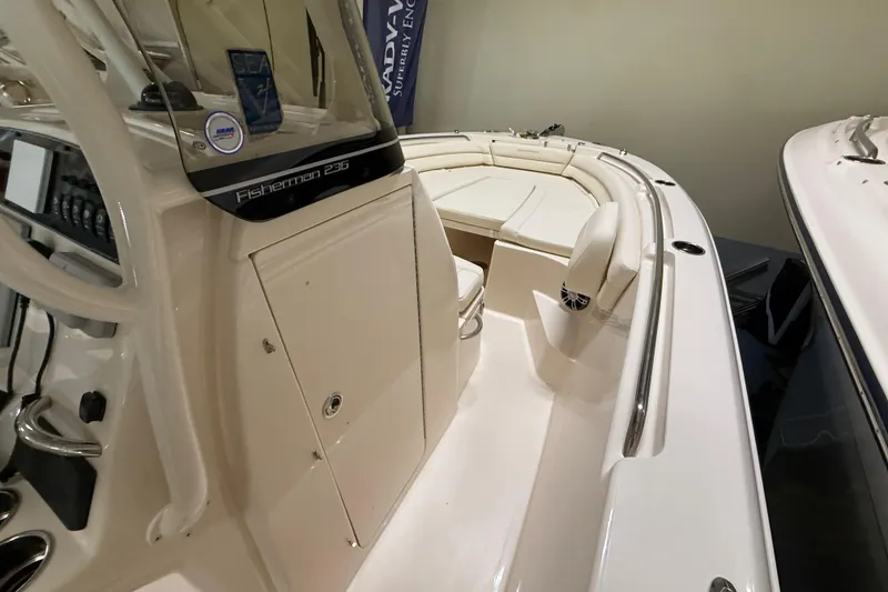 Slide: The Image of 2026 Grady-White Fisherman 236 boat interior with seating and console. - 8
