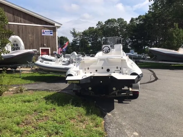 Slide: The Image of 2024 Zar Formenti 59 SL boat at Zar New England dealership. - 2