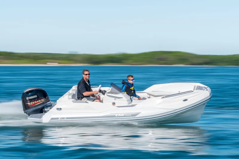 Slide: The Image of 2024 Zar Formenti Tender ZF-5 boat cruising on open water. - 5