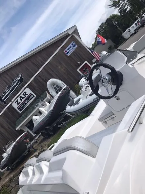 Slide: The Image of 2024 Zar Formenti Tender ZF-5 displayed at a boat dealership. - 8