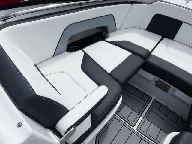 Slide: The Image of Luxurious seating in 2024 Monterey M-65 boat, featuring sleek black and white upholstery. - 19