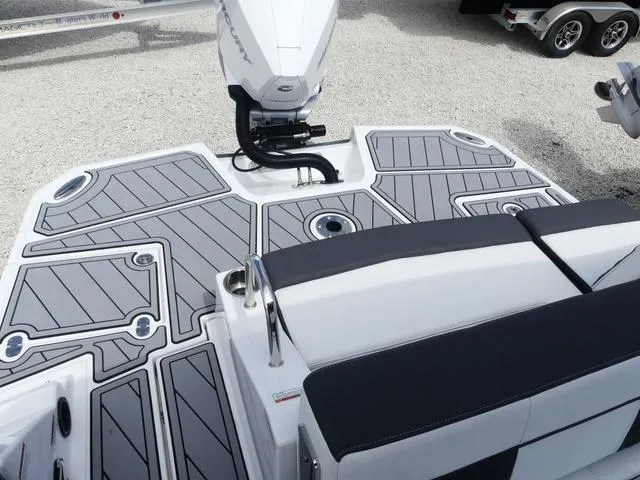 Slide: The Image of 2024 Monterey M-65 boat deck with sleek design and modern seating. - 7