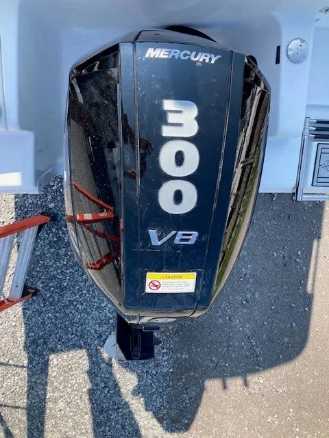 Slide: The Image of 2024 Sea Pro 242 DLX with Mercury 300 V8 outboard engine. - 16