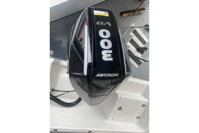 Slide: The Image of 2024 Sea Pro 242 Center Console with Mercury 300 V8 outboard engine. - 17