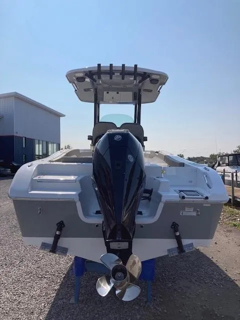 Slide: The Image of 2024 Sea Pro 242 DLX center console boat on display. - 3