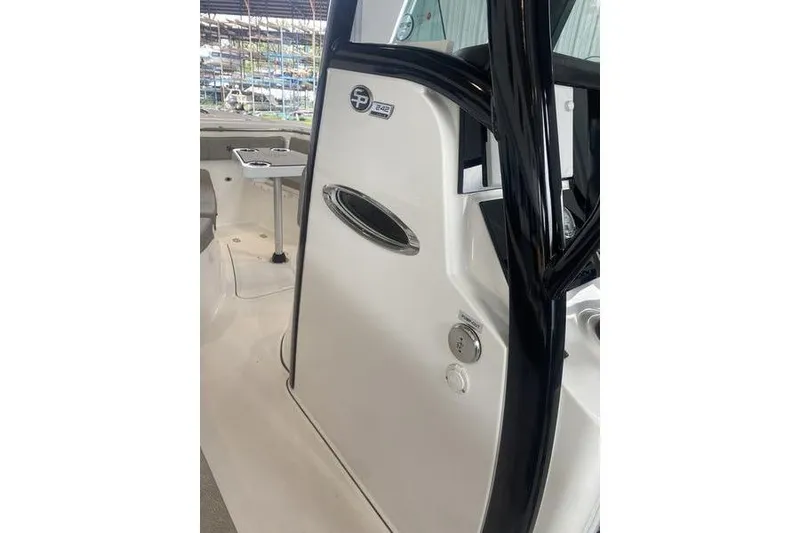 Slide: The Image of 2024 Sea Pro 242 Center Console boat interior with sleek design and modern features. - 30