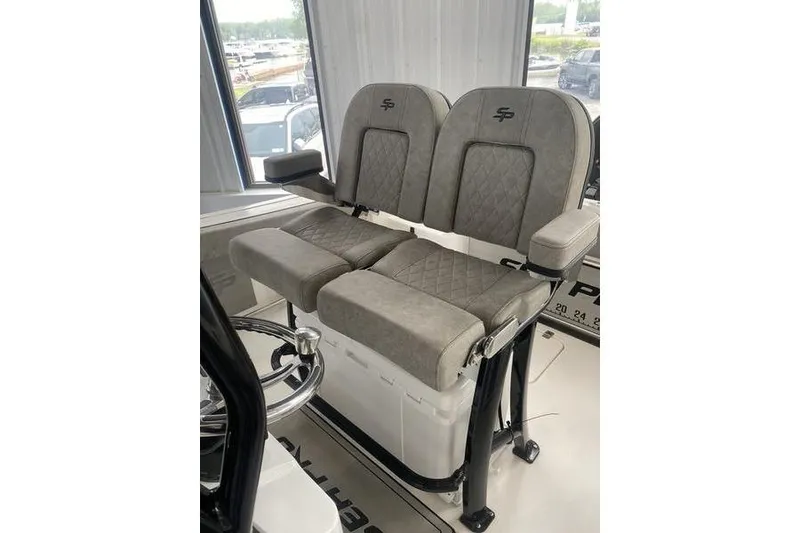Slide: The Image of 2024 Sea Pro 242 Center Console boat seats with armrests and quilted design. - 34