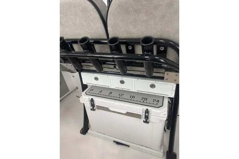 Slide: The Image of 2024 Sea Pro 242 Center Console boat with rod holders and storage compartments. - 36