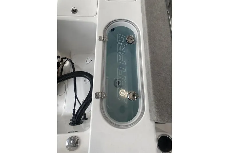 Slide: The Image of 2024 Sea Pro 242 Center Console boat interior with branded compartment. - 62