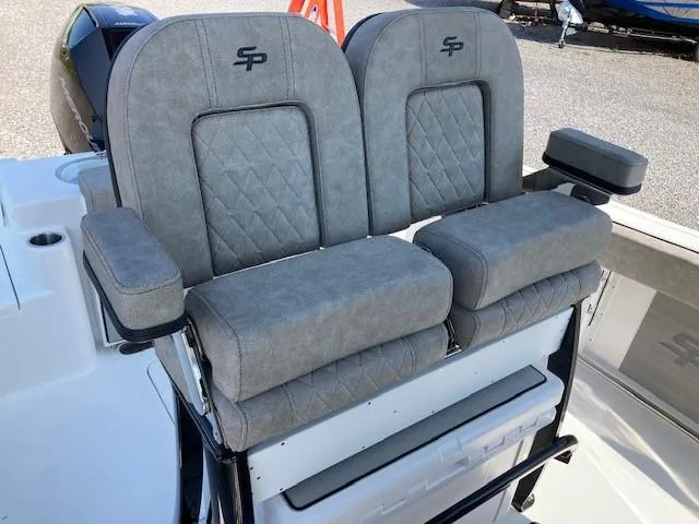 Slide: The Image of 2024 Sea Pro 242 Center Console boat with Mercury outboard motor in showroom. - 9