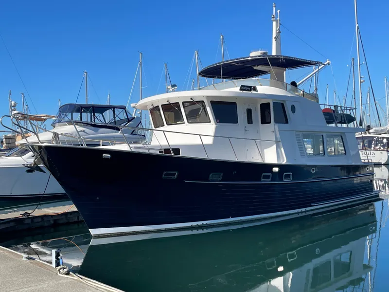 The Image of Integrity 45 yacht, 2012 model, docked at marina with clear blue sky. - 0