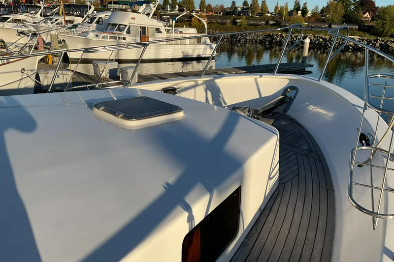 Slide: The Image of Integrity 45 yacht, 2012 model, docked in a marina with other boats. - 11