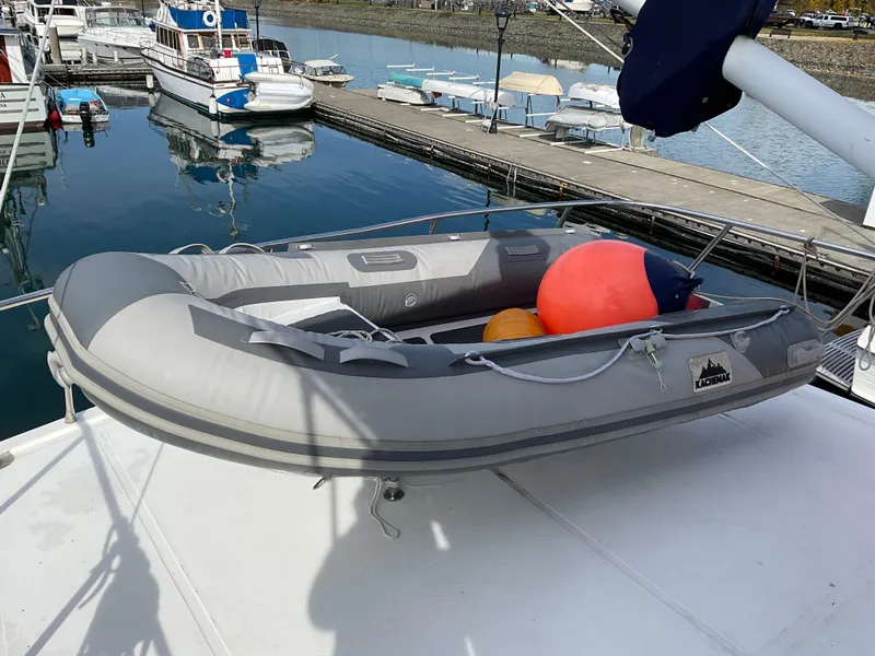 Slide: The Image of Inflatable dinghy on Integrity 45 yacht, docked at marina, 2012 model. - 13