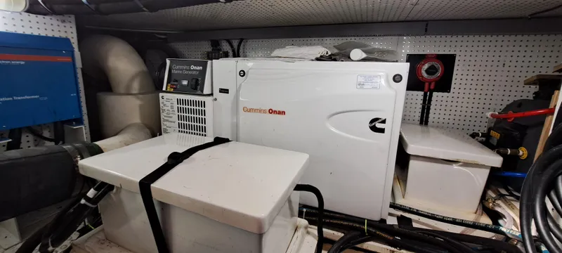 Slide: The Image of Integrity 45 2012 engine room with Cummins Onan generator and equipment. - 31