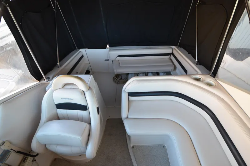 Slide: The Image of 2000 Chaparral Signature 270 boat interior with white seating and black accents. - 4