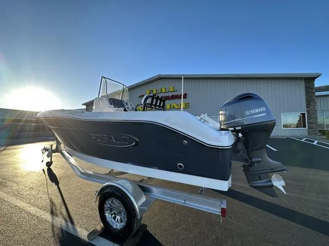 Slide: The Image of 2024 Robalo R180 boat on trailer with Yamaha outboard motor. - 3