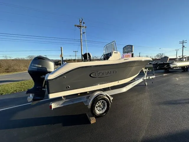Slide: The Image of 2024 Robalo R180 boat on trailer with Yamaha outboard motor. - 5