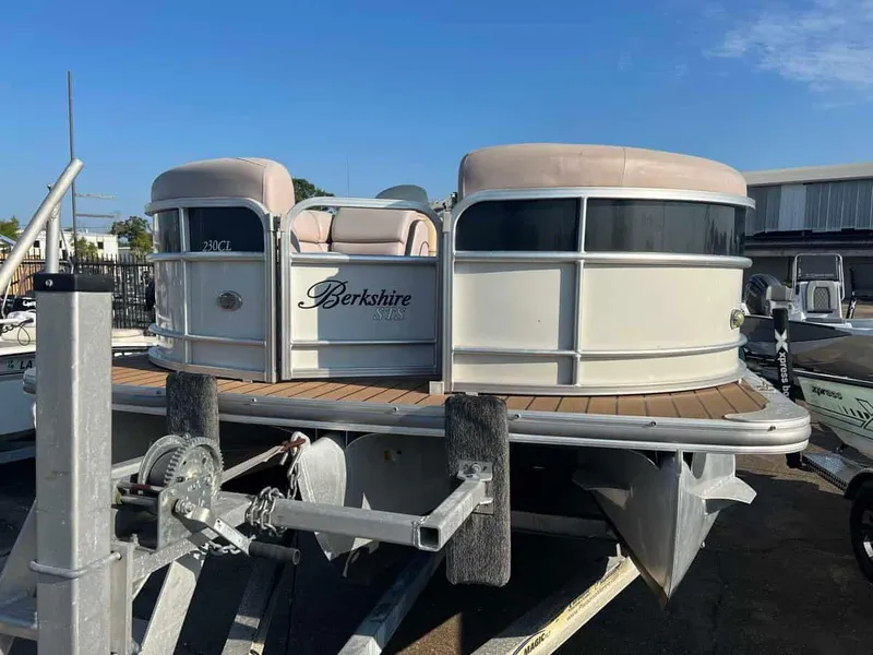 Slide: The Image of 2015 Berkshire 230 CL pontoon boat on a trailer. - 3