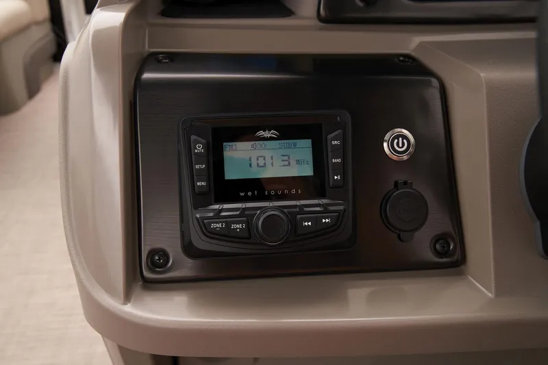 Slide: The Image of 2024 Sun Tracker SportFish 22 DLX dashboard with stereo system. - 44