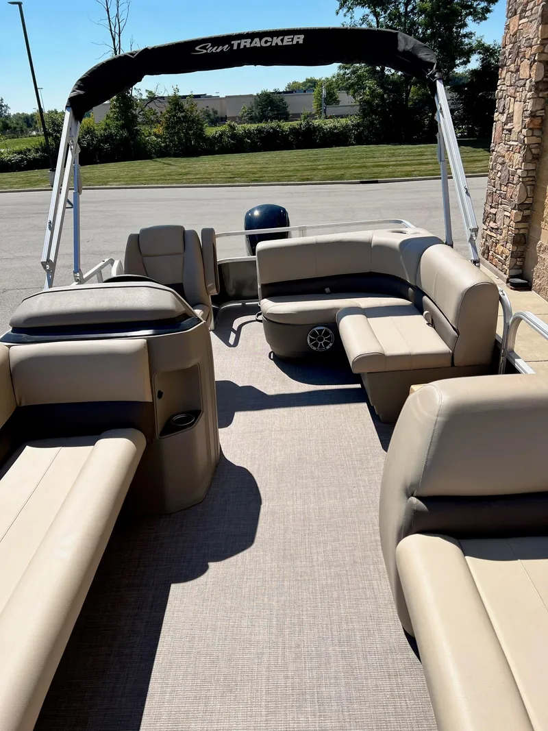 Slide: The Image of 2024 Sun Tracker Party Barge 18 DLX pontoon boat with spacious seating and canopy. - 3