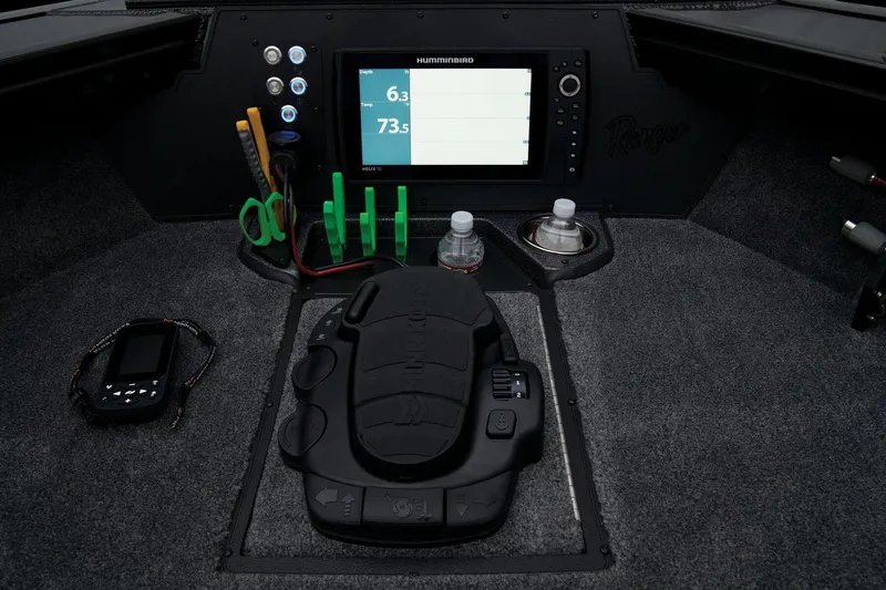 Slide: The Image of 2024 Ranger VX1888 WT boat dashboard with Humminbird display and controls. - 22