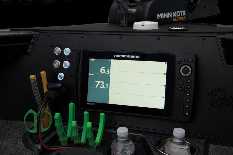 Slide: The Image of Humminbird fish finder on 2024 Ranger VX1888 WT boat dashboard with tools and water bottles. - 25