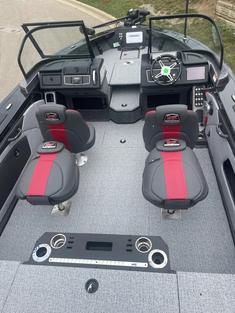 Slide: The Image of 2024 Ranger VX1888 WT boat interior with dual seats and modern dashboard. - 3